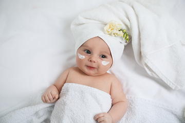 What kind of lotion should young children use to keep their skin strong and moisturized?